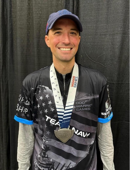 Team Navy Master Chief Steve Flemming wins a silver medal in the standing air rifle competition at the 2024 Department of Defense Warrior Games, June 24, 2024.